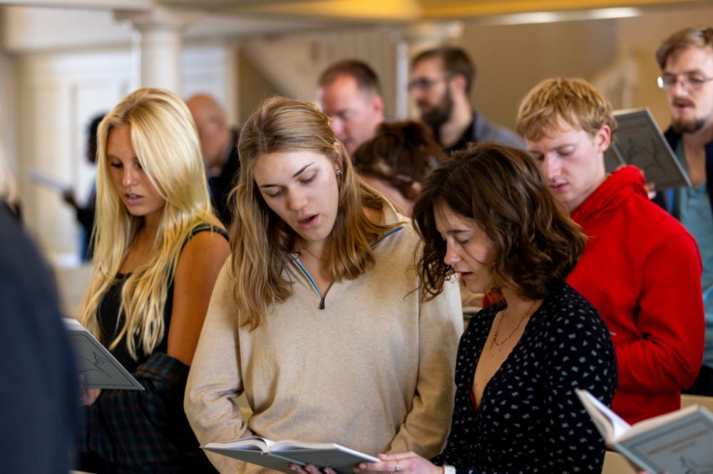 Girl on campus green reading